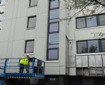 Cladding being stripped at Malus Court Salford